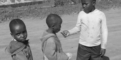 children sharing a lolipop-poverty