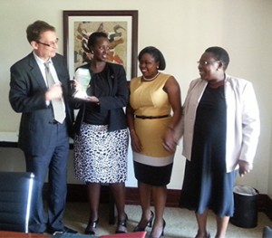 Outgoing URA Commisioner General Allen Kagina, (second from right) during her farewell event at Kampala, Uganda. She leaves URA after serving for over 10 years. Others in the photo, (left to right)TradeMark Africa (TMA) Director General David Stanton, TradeMark Africa (TMA) Uganda Country Director, Allen Asiimwe and URA Caroline Birakwate. 
