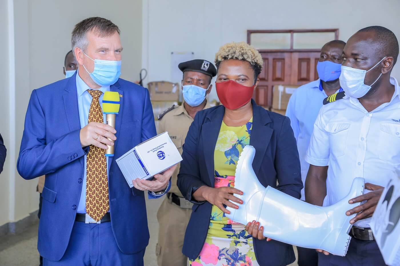 Elegu border front line staff and informal traders receive Personal Protective Equipment from TradeMark Africa